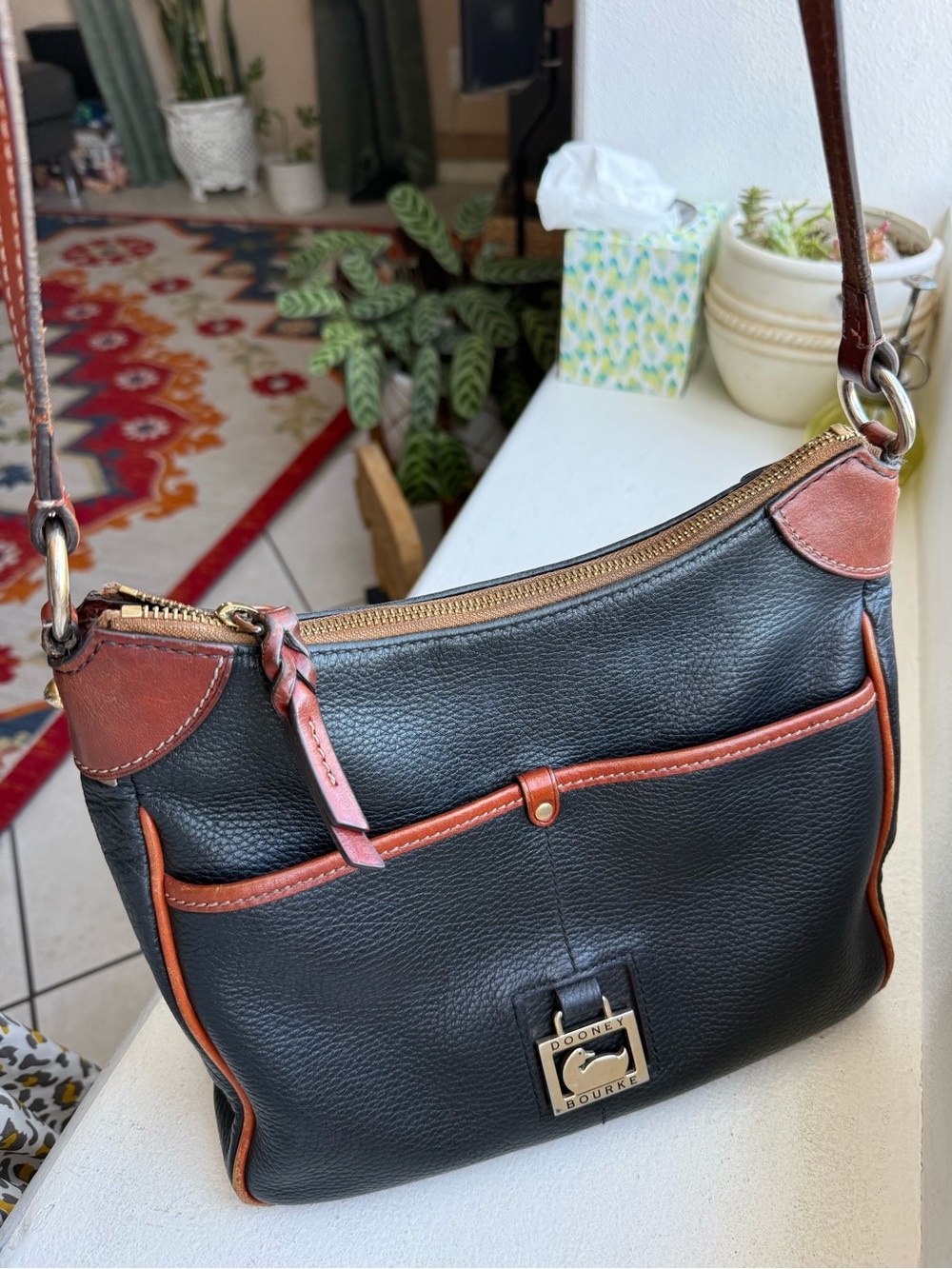 Dooney & Bourke Black Leather Shoulder Bag with Brown Trim Accents